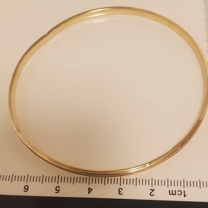 Two 14 kt gold bracelets